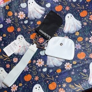 Lululemon White Mini Pouch with Silver Accents